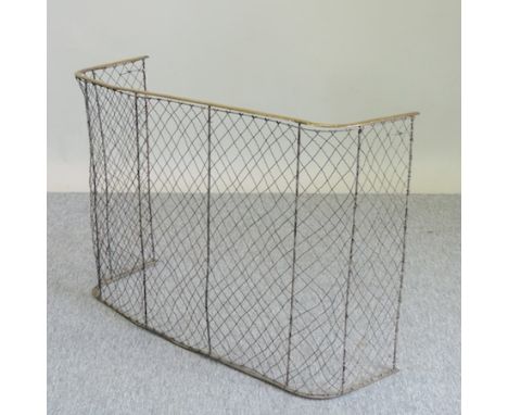 A 19th century brass and wire fire screen, 102cm