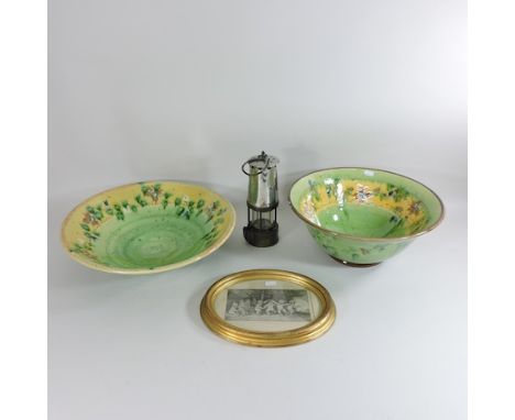 A French studio pottery green glazed bowl, 41cm, together with another, a hurricane lamp and a print 