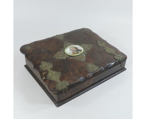 A 19th century simulated walnut and brass mounted writing slope, inset with a porcelain portrait medallion, 34cm