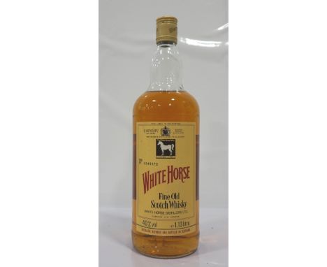 WHITE HORSE CIRCA 1980sA bottle of the world famous White Horse Fine Old Blended Scotch Whisky.  1.13 Litre.  40% abv.  Level