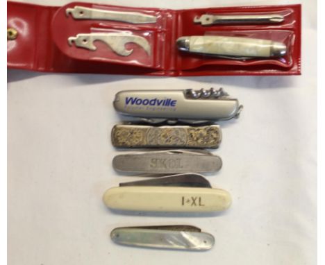 Collection of pocket knives of various styles including Rogers of Sheffield pruning knife, Woodville promotional pocket knife