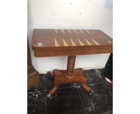 A regency card/ games table, with backgammon top