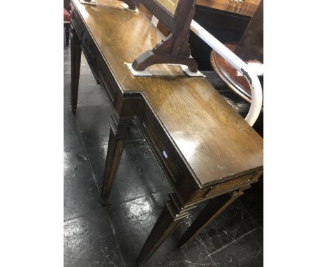 A mahogany break front console/ hall table