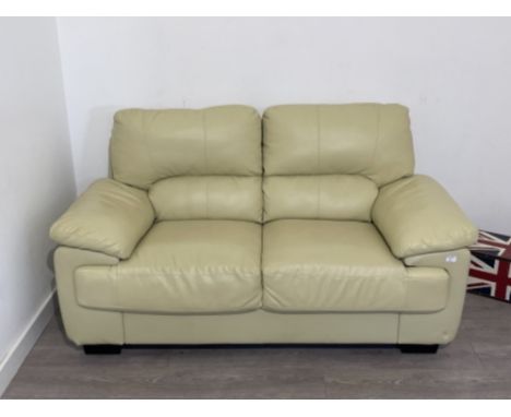 Cream leather 2 seater sofa. Great condition