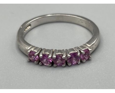 Ladies 18ct white gold Pink sapphire ring. Comprising of 5 round pink sapphires all claw set. 2.77g size K