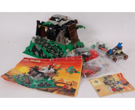 LEGO; An original vintage Lego System Castle, unboxed but with instructions, along with Lego set 4816, also with instructions