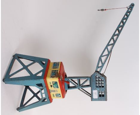 TINPLATE; An original vintage tinplate West German made by DGBM clockwork tinplate crane. Wind the mechanism and the crane op