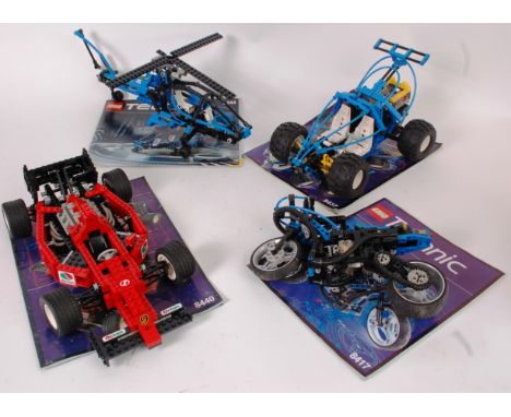 LEGO; A collection of 4x vintage Lego Technics sets (unboxed, but with instructions) comprising of set numbers; 8444, 8437, 8