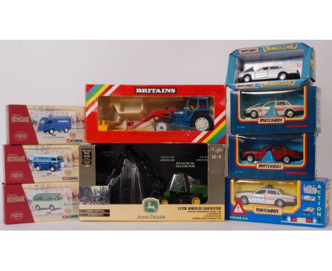 DIECAST; A mixed lot of boxed diecast models, comprising of; 3x Corgi Heritage, ERTL John Deere Harvester, a Britains Tractor