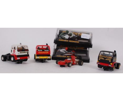 SCALEXTRIC; A collection of vintage Scalextric cars and vehicles to include 2x boxed Motorcycles, 3x loose lorries and a C206