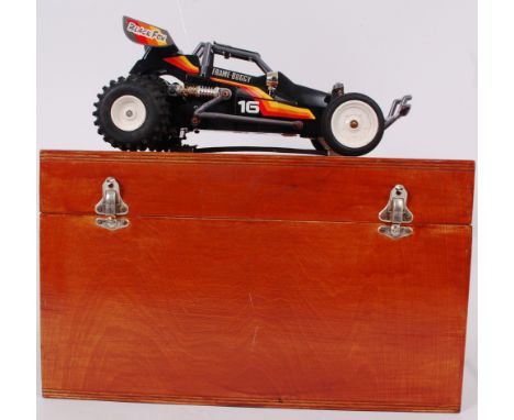 RC CAR; An original vintage retro Nikko remote control car, complete with handset and aerial within a good custom made wooden