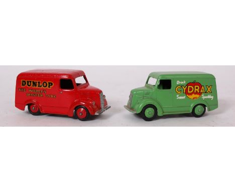 DINKY; Two vintage Dinky Trojan diecast models; Dunlop tyres in red, and Cydrax Trojan, in green.