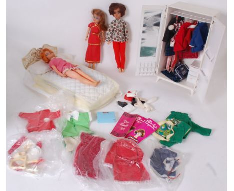 SINDY; A collection of vintage Sindy dolls (x 3 ) along with a selection of vintage Sindy clothing and accessories / furnitur