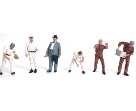 DIECAST; A collection of fabulous detailed 1:18 scale diecast painted metal figures - mostly pit crew, one racing driver and 