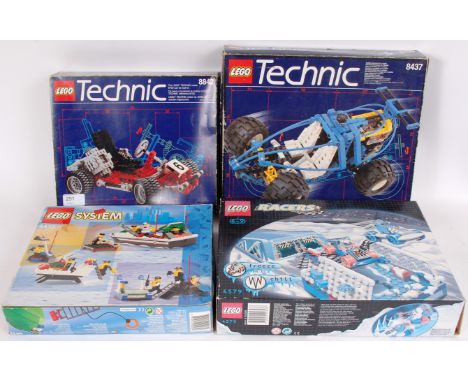 LEGO; A collection of 4x vintage Lego sets, comprising of; Technics 8842, Technics 8437, Racers 4379 and Lego System set 6433