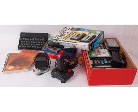 SINCLAIR ZX SPECTRUM; A vintage retro ZX Spectrum computer games console, complete with ancillary components (joystick, leads