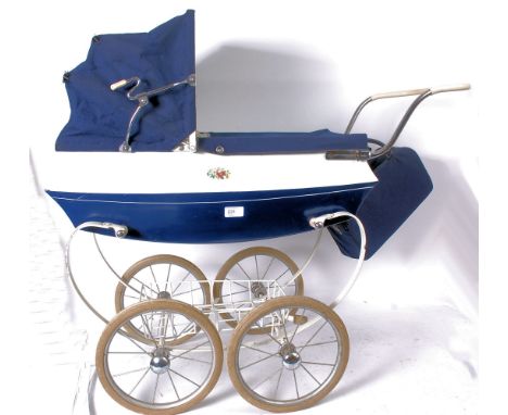 PRAM; A vintage 1960's Leeway Silvercross style girls pram, in blue and white. Complete with original blue hood and interior,