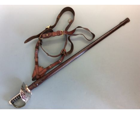 George V Royal Engineers Officer's sword in brown leather scabbard and belt strap. IMPORTANT: Online viewing and bidding only