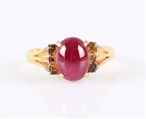 A ruby single stone ring, set with an oval ruby cabochon, measuring approx. 9x6mm, stamped with Chinese character marks, ring