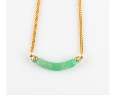 A green jade necklace, comprising a curved piece of carved jade attached to a belcher link chain, stamped 916. IMPORTANT: Onl