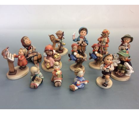 Fourteen Goebel Hummel figurines. IMPORTANT: Online viewing and bidding only. No in person collections, Mail Boxes Etc courie