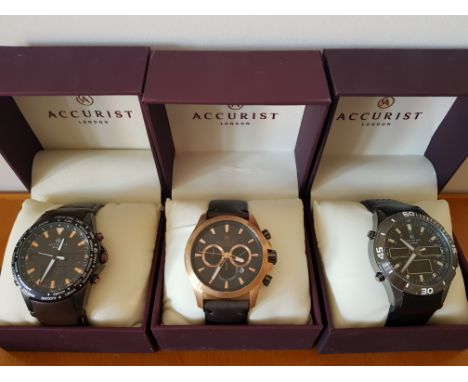 *Three boxed Accurist wrist watches, to include two World Time examples numbered 7101 and 7192 and a chronograph example numb