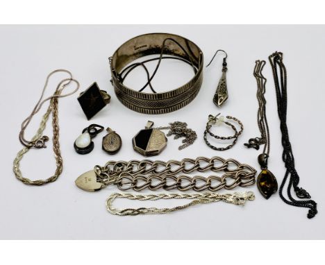 A collection of 925 silver jewellery including bangle, bracelet, chains etc.