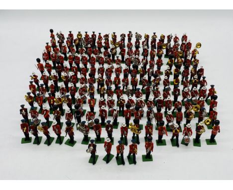 A large collection of Britains plastic figurines all relating to military marching bands including British Grenadiers, Royal 