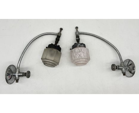 A pair of vintage chrome light fittings with glass shades 