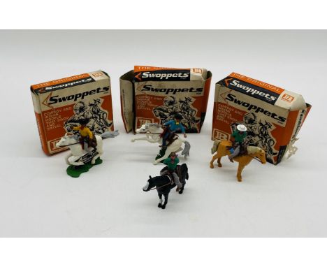 Three boxed Britains Swoppets cowboy model figures including Cowboy Prisoner Mounted (640 - box A/F), Cowboy Knife Fighter Mo