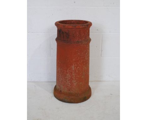 A vintage terracotta chimney pot, height 43cm