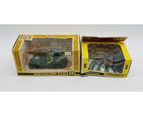 A vintage boxed Britains U.S. Jeep military vehicle metal and plastic model (9786), along with a German Army Combination die-