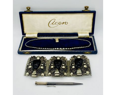 An SCM three panelled bracelet decorated with faces along with a Mordan Everpoint pencil and a faux pearl necklace (in need o