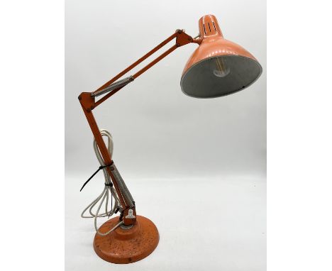 A vintage orange Anglepoise style lamp by Thousand & One Lamps Limited