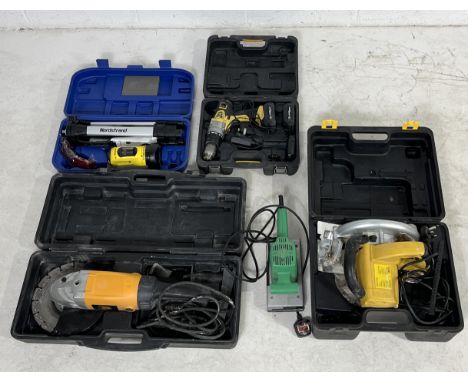 A collection of various power tools including sander, level, JCB driver etc.