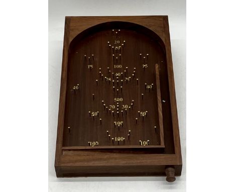 A miniature bagatelle board 20cm x 36cm
