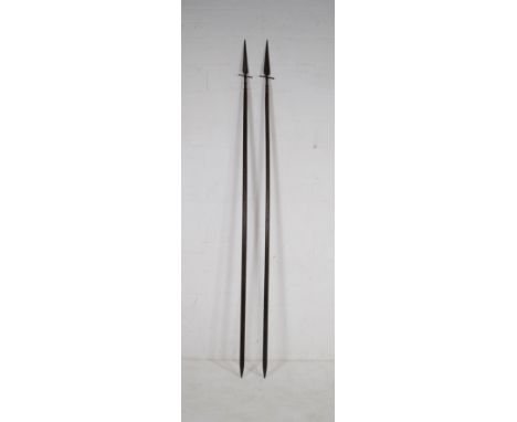 Two vintage pikes, with indistinct numerical marks to blades - length 272cm