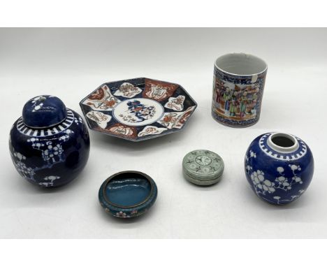 A collection of Oriental china including large Famille Rose cup, ginger jars etc.