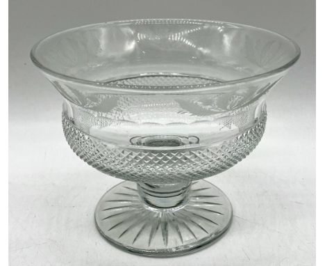 An Edinburgh crystal bowl with etched thistle decoration diameter 20cm, along with a tankard, paperweight etc