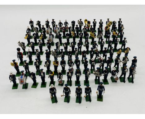 A collection of Britains marching bands plastic figurines including Royal Marines, Salvation Army etc - some missing heads