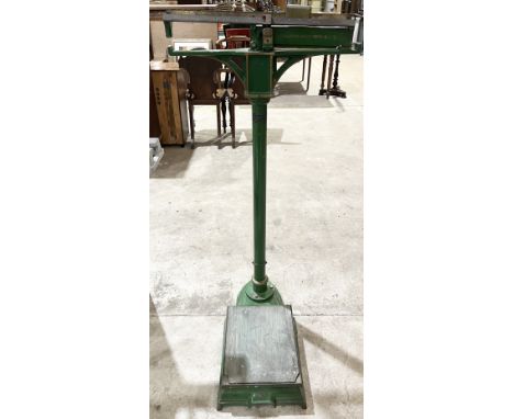 An antique set of scales by Stevens & Sons 'To weigh 24 stone' with green painted detail