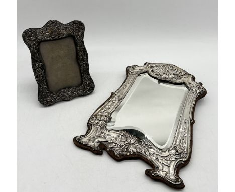 A large hallmarked silver Art Nouveau mirror A/F along with a hallmarked silver photo frame