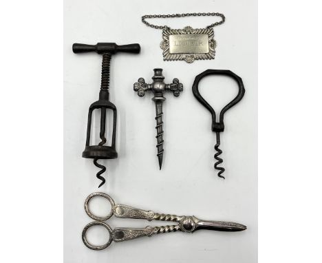 A collection of items including an S. Maw & Son London champagne tap with Fleur de Lys handle, corkscrew etc.
