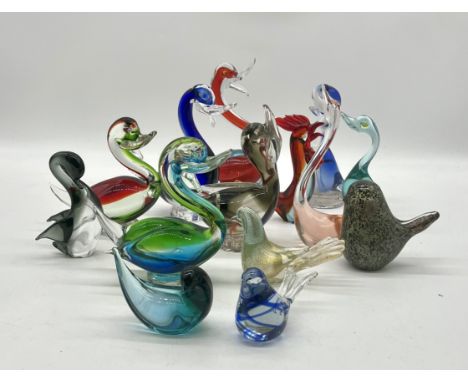 A collection of art glass birds including Murano