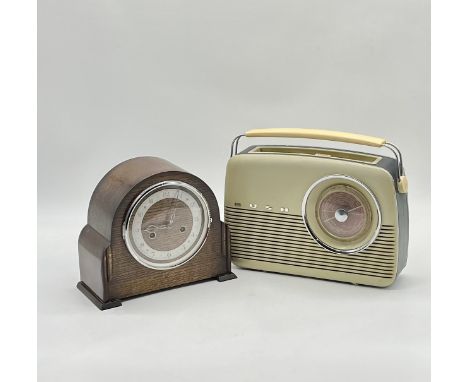 A vintage Bush radio along with an Enfield mantle clock. 