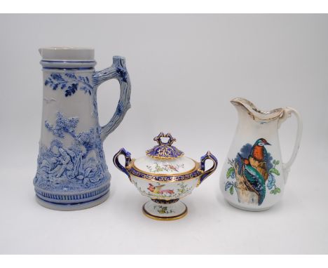 A Royal China Works Worcester lidded urn with gilt decoration along with a Wedgwood Woodpecker jug etc.