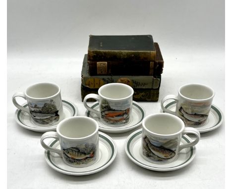 A set of five Portmeirion cups and saucers along with one extra cup, the cups have illustrations of various fish, along with 