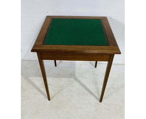 A reversable turn of the century mahogany card table