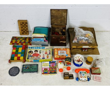 A collection of various vintage toys including building blocks, Chad Valley children's record player, draughts board, plastic