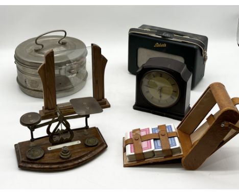 A collection of various items including postal scales, Roberts radio, metal canteen etc.